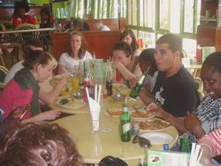 Volunteers taste local food during orientation.