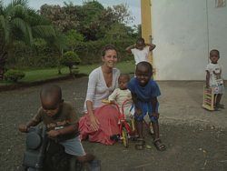 Volunteer teaching:  Volunteer teacher plays with school children in Tanzania.